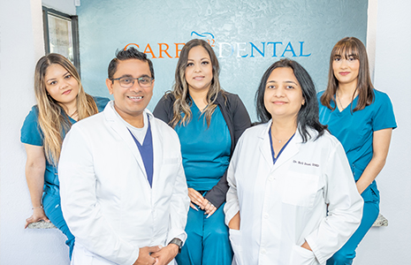 Smiling dentists and dental team members at Care 32 Dental of Fort Worth