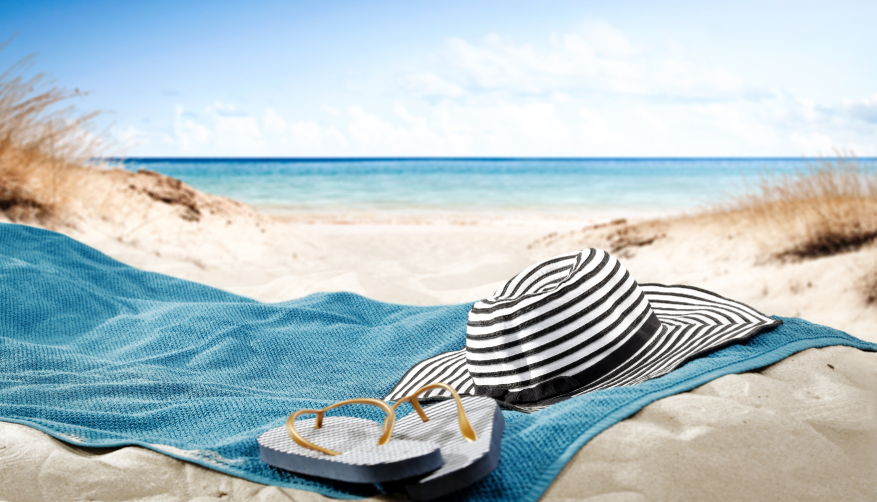 Beach blanket with hat and flip flops