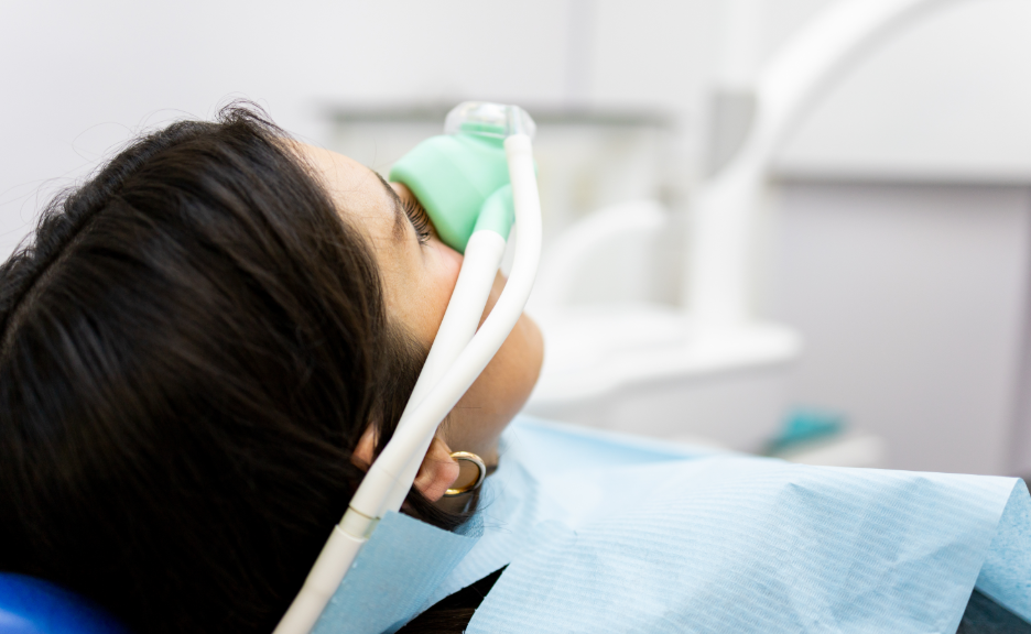 Woman receiving dental sedation